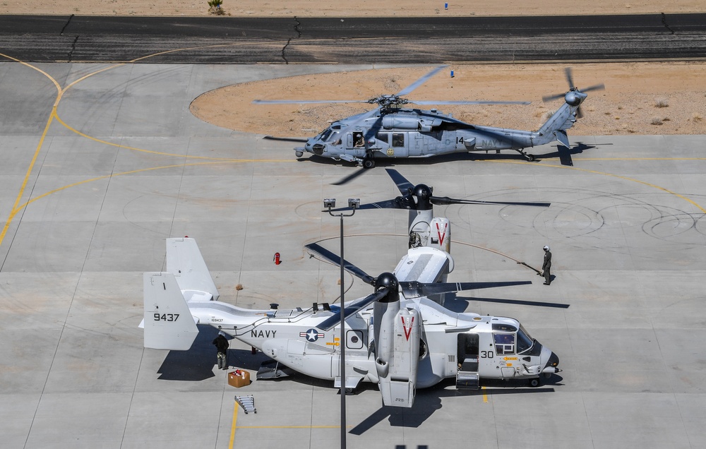 Helicopter Sea Combat Squadron (HSC) 4 Conducts Air Delivered Ground Refueling (ADGR) Evolution with Navy CMV-22B Osprey