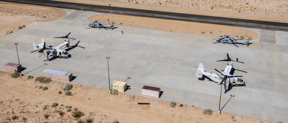 Helicopter Sea Combat Squadron (HSC) 4 Conducts Air Delivered Ground Refueling (ADGR) Evolution with Navy CMV-22B Osprey