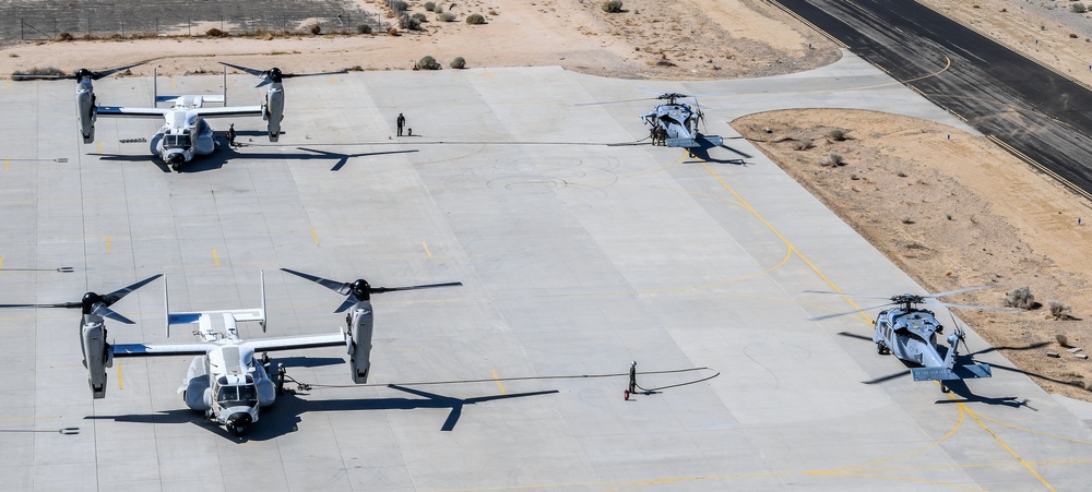 Helicopter Sea Combat Squadron (HSC) 4 Conducts Air Delivered Ground Refueling (ADGR) Evolution with Navy CMV-22B Osprey