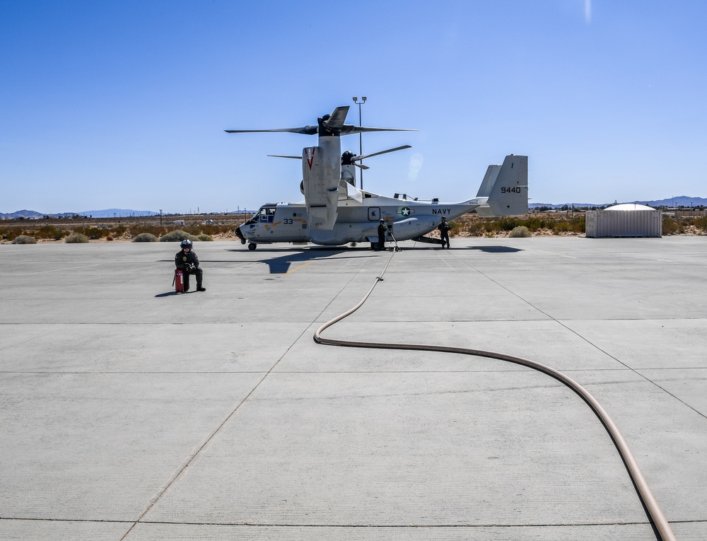 Helicopter Sea Combat Squadron (HSC) 4 Conducts Air Delivered Ground Refueling (ADGR) Evolution with Navy CMV-22B Osprey