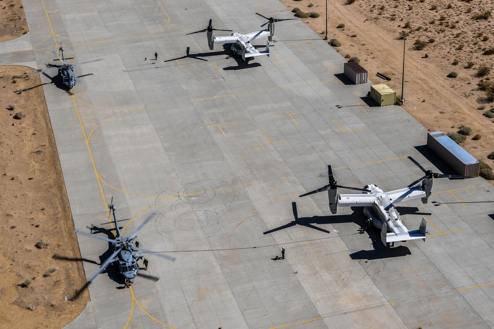 Helicopter Sea Combat Squadron (HSC) 4 Conducts Air Delivered Ground Refueling (ADGR) Evolution with Navy CMV-22B Osprey