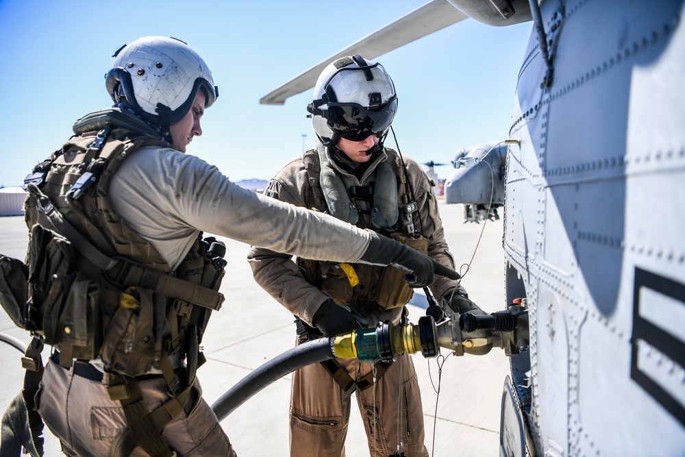 Helicopter Sea Combat Squadron (HSC) 4 Conducts Air Delivered Ground Refueling (ADGR) Evolution with Navy CMV-22B Osprey