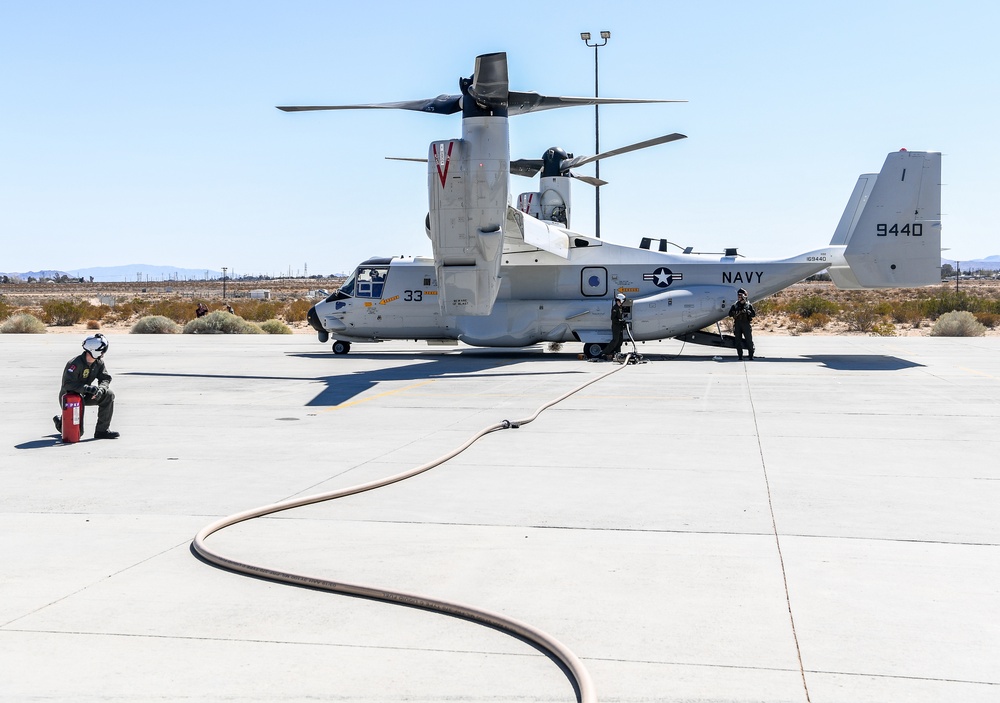 Helicopter Sea Combat Squadron (HSC) 4 Conducts Air Delivered Ground Refueling (ADGR) Evolution with Navy CMV-22B Osprey