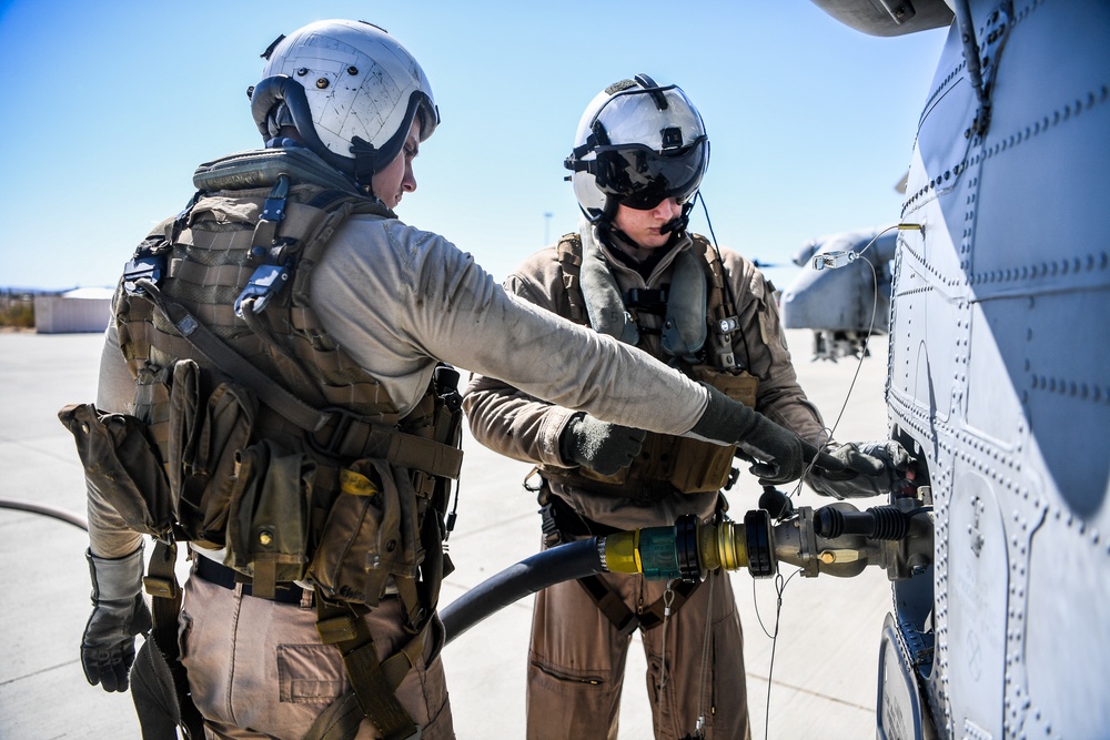 Helicopter Sea Combat Squadron (HSC) 4 Conducts Air Delivered Ground Refueling (ADGR) Evolution with Navy CMV-22B Osprey