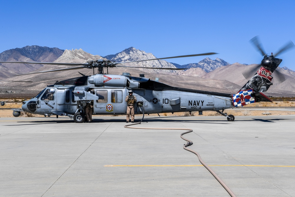 Helicopter Sea Combat Squadron (HSC) 4 Conducts Air Delivered Ground Refueling (ADGR) Evolution with Navy CMV-22B Osprey