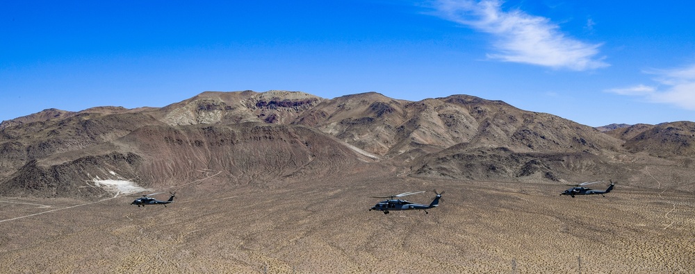 Three MH-60S Knighthawk Helicopters of HSC 4 Fly in Formation