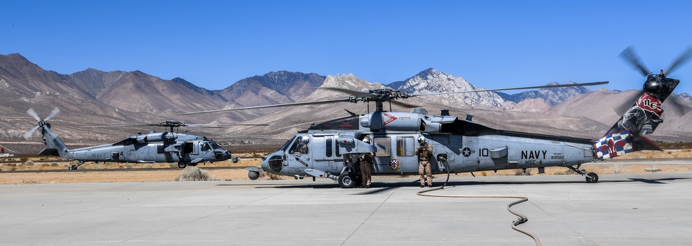 Helicopter Sea Combat Squadron (HSC) 4 Conducts Air Delivered Ground Refueling (ADGR) Evolution with Navy CMV-22B Osprey