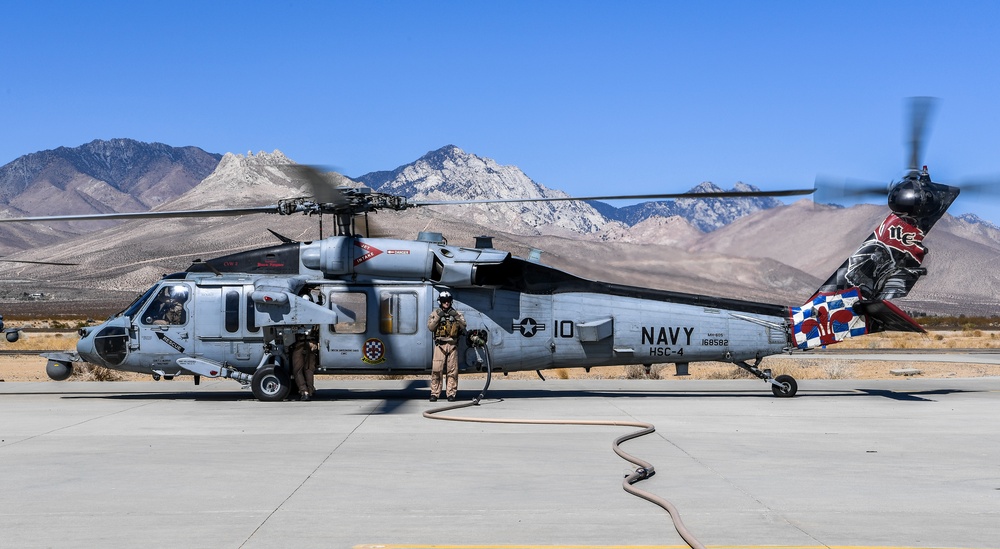 Helicopter Sea Combat Squadron (HSC) 4 Conducts Air Delivered Ground Refueling (ADGR) Evolution with Navy CMV-22B Osprey