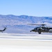 Two MH-60S Knighthawk Helicopters of HSC 4 Fly in Formation