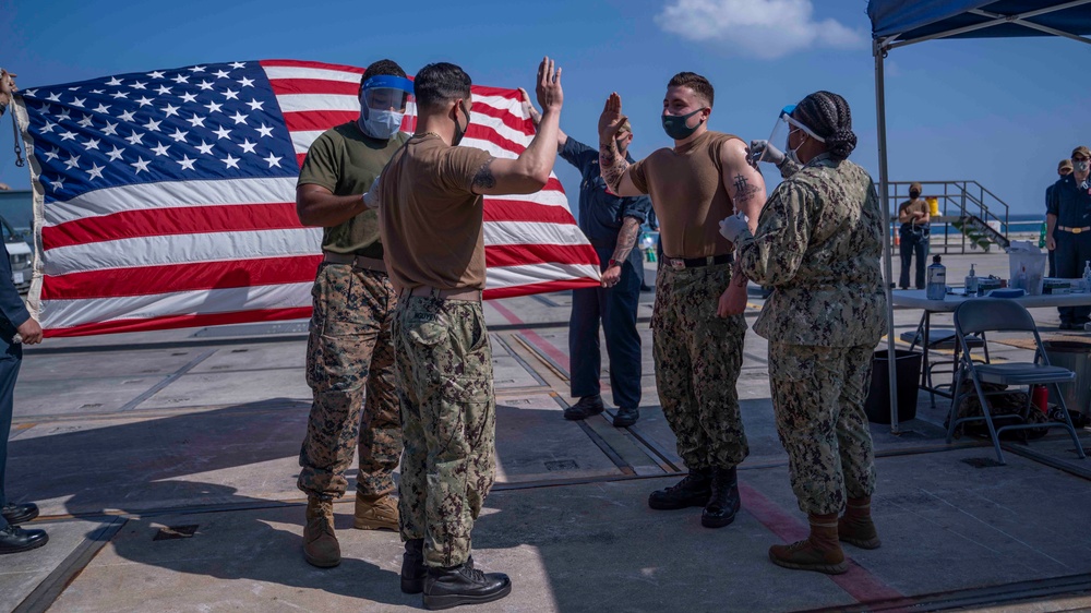GERMANTOWN Sailor Reenlists While Receiving Second COVID Vaccine Dose