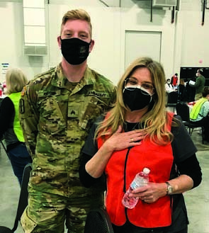 Michigan National Guard medic saves a nurse at a vaccine clinic