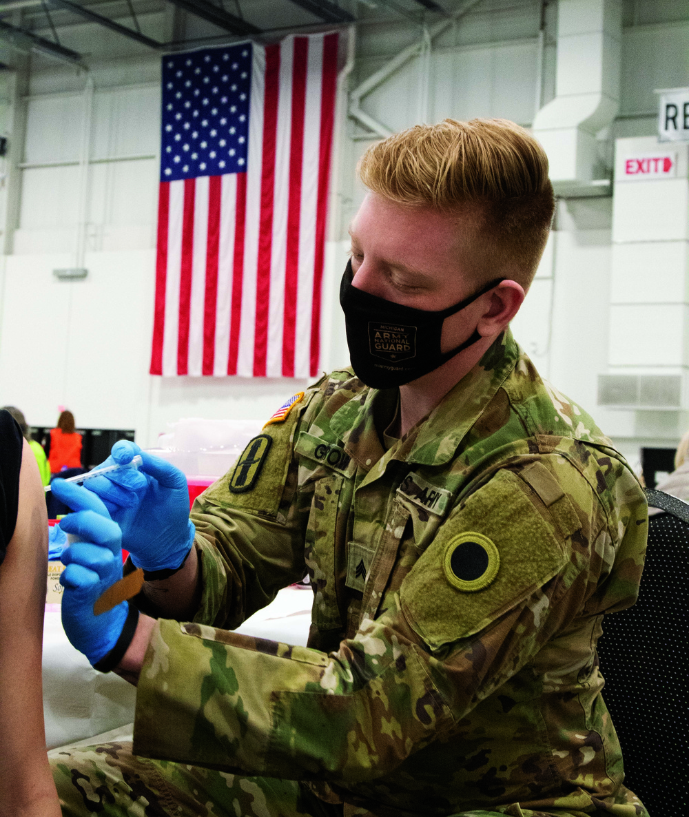 Michigan National Guard medic saves a nurse at a vaccine clinic