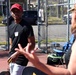 Cal Guard Soldiers receive a pickleball lesson from Red Bluff community members