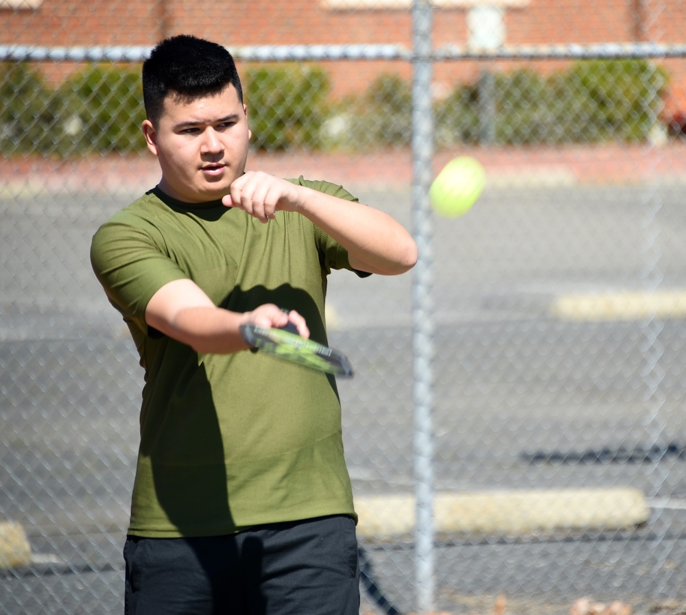 Cal Guard Soldiers receive a pickleball lesson from Red Bluff community members