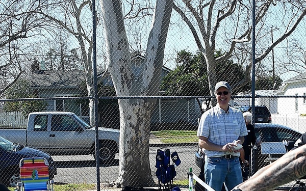 Cal Guard Soldiers receive a pickleball lesson from Red Bluff community members