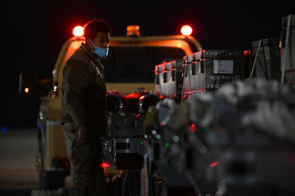 356th AMU Airmen load ordnance on F-35s