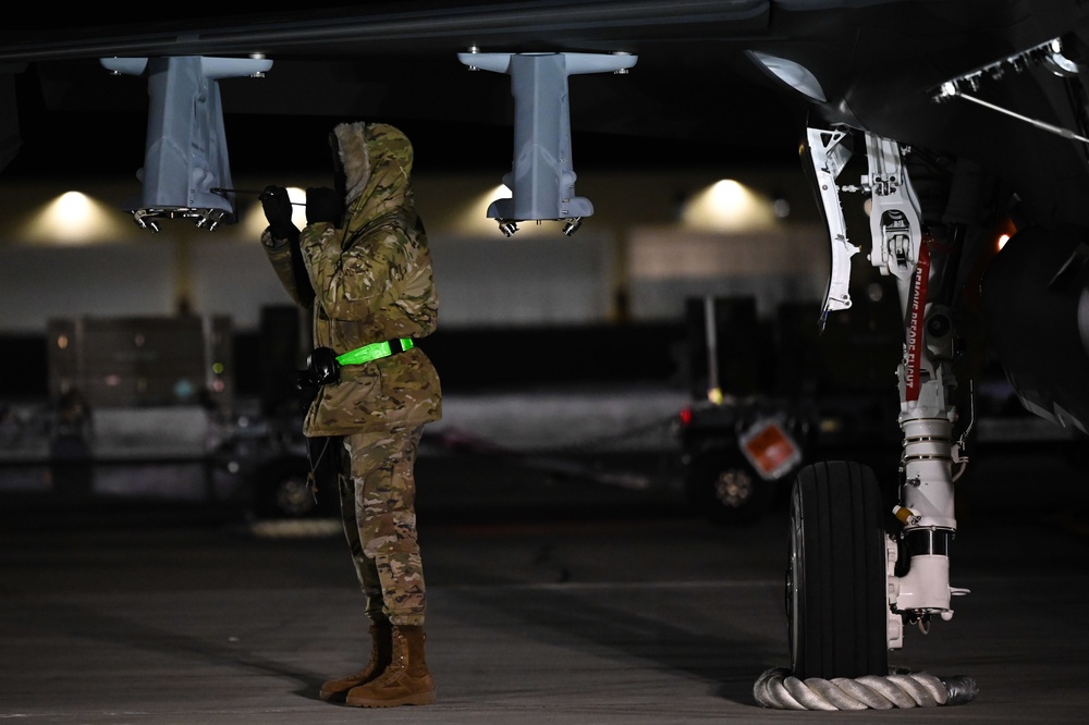 356th AMU Airmen load ordnance on F-35s