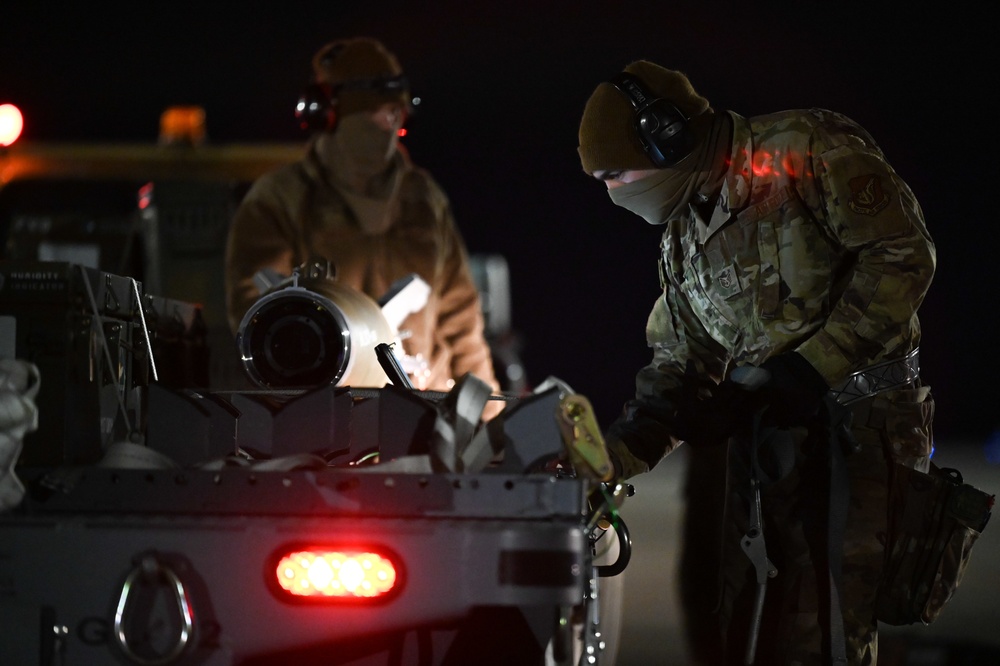 356th AMU Airmen load ordnance on F-35s