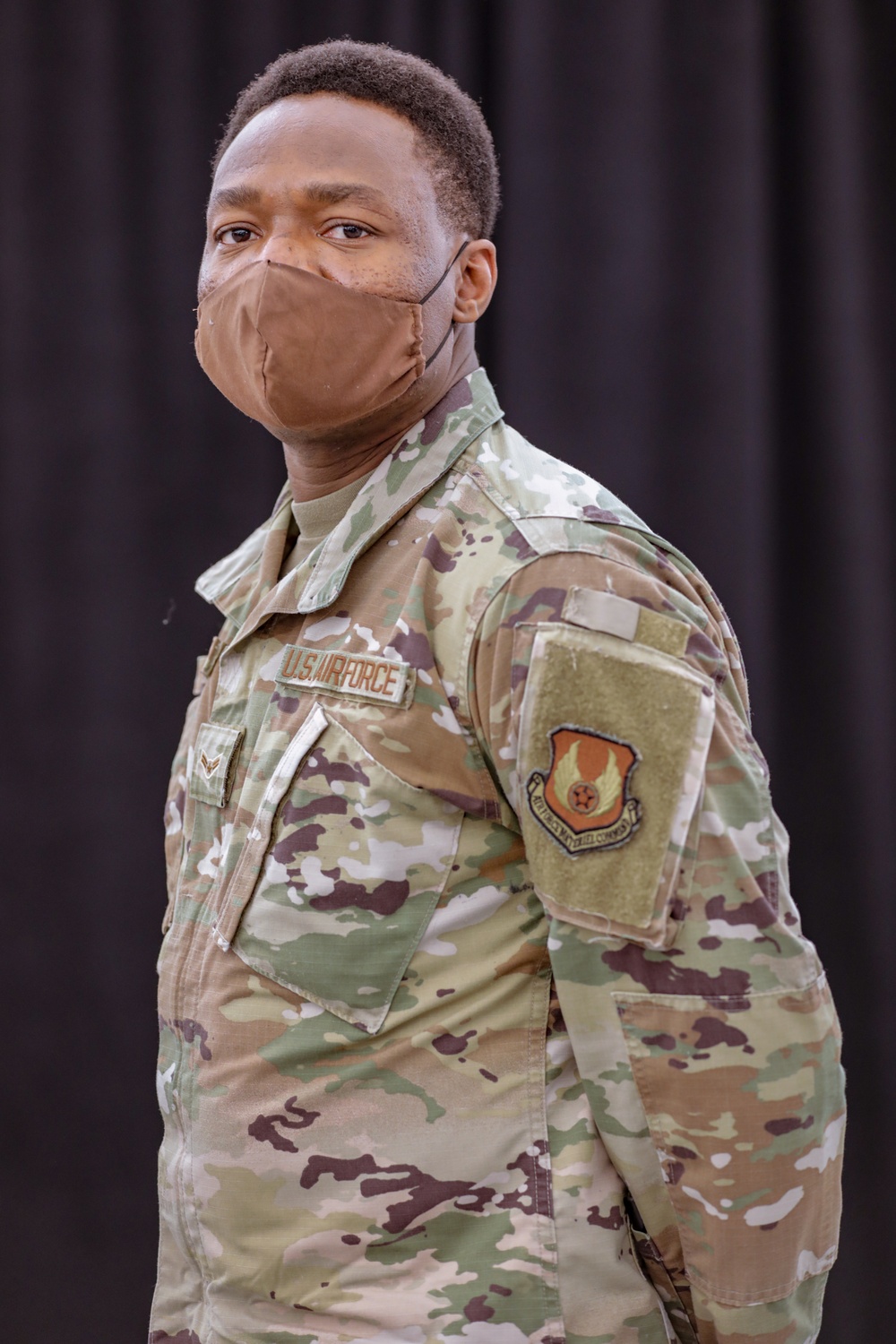 U.S. Air Force Airman 1st Class Adedayo Daramola talks about his role at the Ford Field Community Vaccination Center