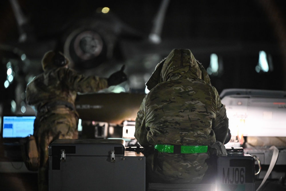 356th AMU Airmen load ordnance on F-35s