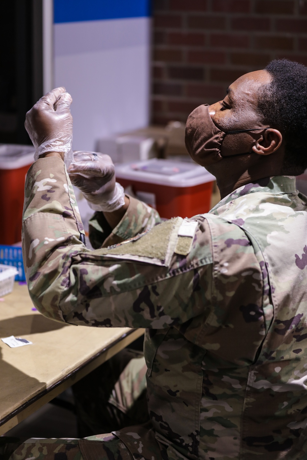 U.S. Air Force Airman 1st Class Adedayo Daramola talks about his role at the Ford Field Community Vaccination Center