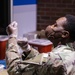 U.S. Air Force Airman 1st Class Adedayo Daramola talks about his role at the Ford Field Community Vaccination Center