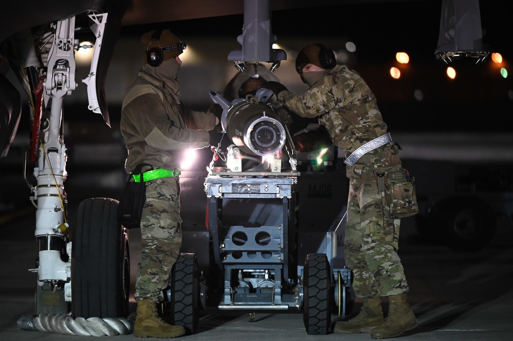 356th AMU Airmen load ordnance on F-35s