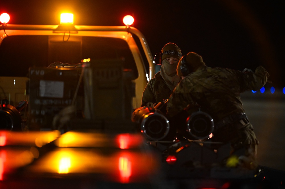 356th AMU Airmen load ordnance on F-35s