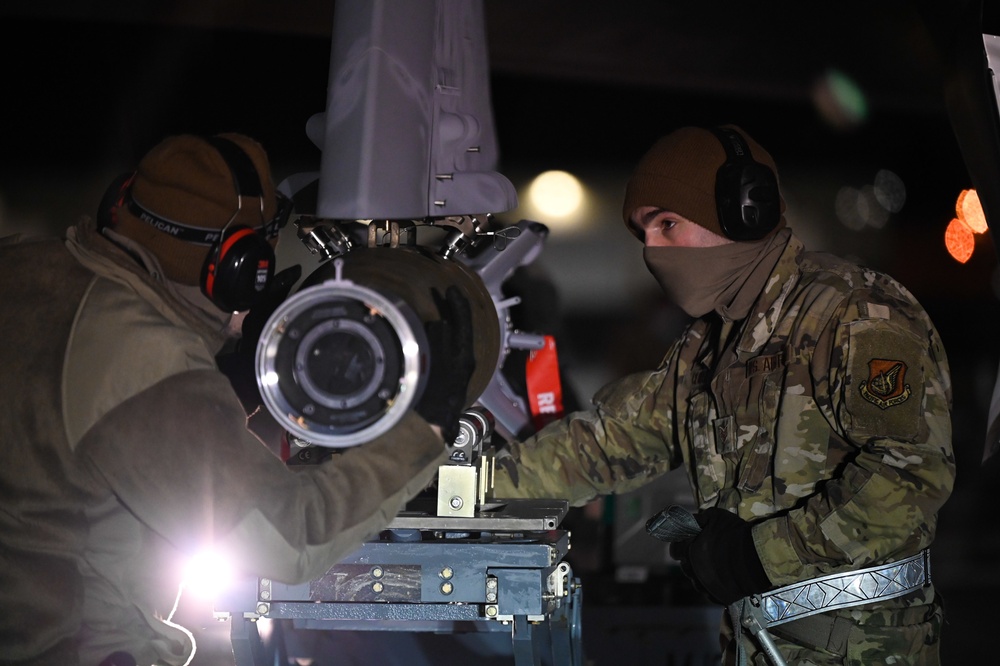 356th AMU Airmen load ordnance on F-35s