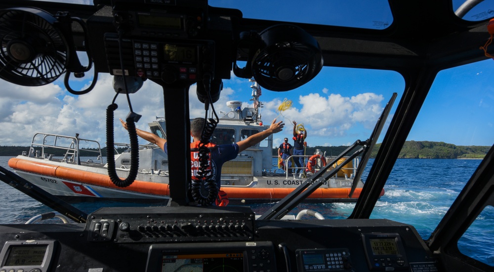 U.S. Coast Guard Sector Guam Units Conduct Distressed Boat Recovery Training