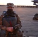 1st Brigade Combat Team, 82nd Airborne Division Soldier awaits plane loading at dusk for jump
