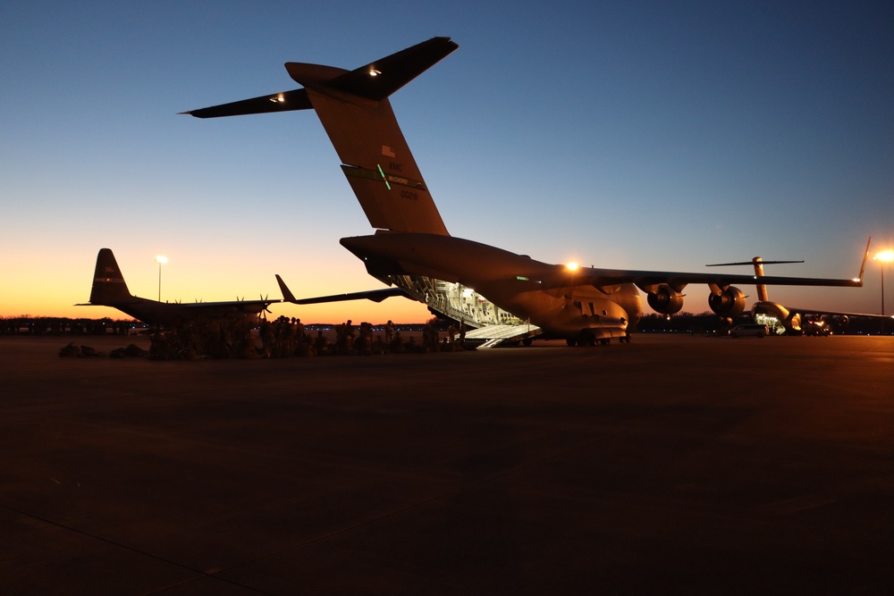 Planes at sunset awaiting Soldiers for jump at Joint Readiness Training Center