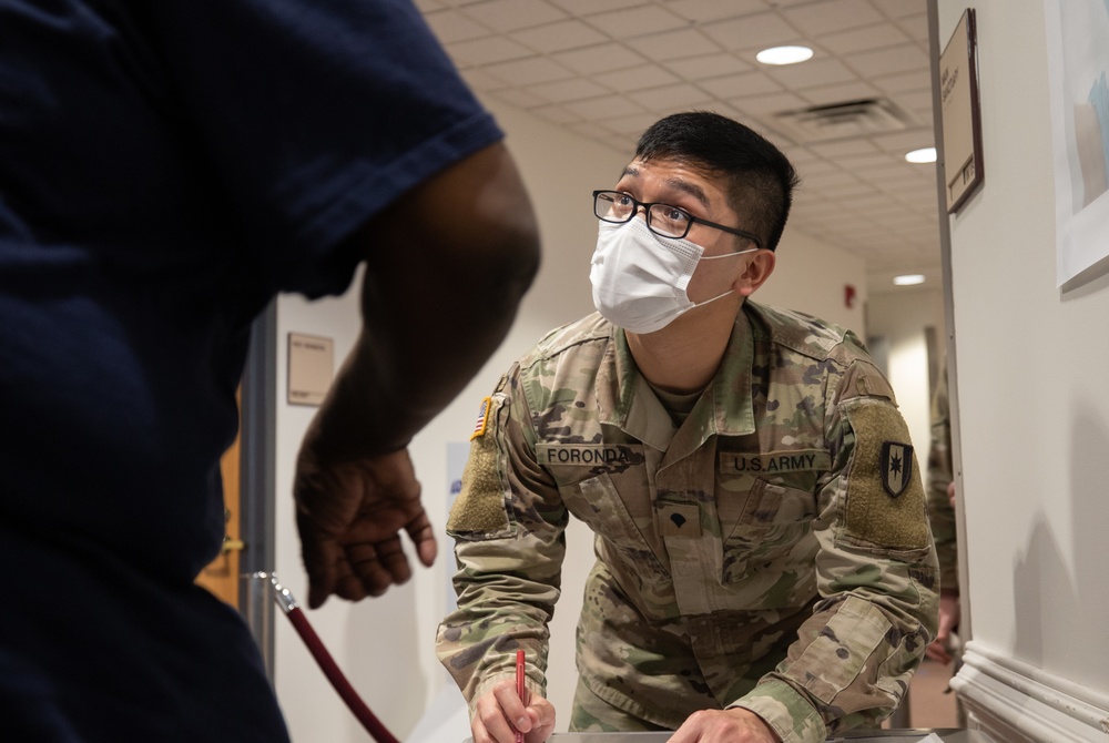 Service members assist FEMA with second inoculations in Somerset, NJ