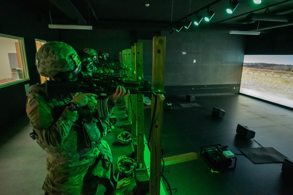 811th Hospital Center Soldiers complete M9 and M4 simulations training on Engagement Skills Trainer