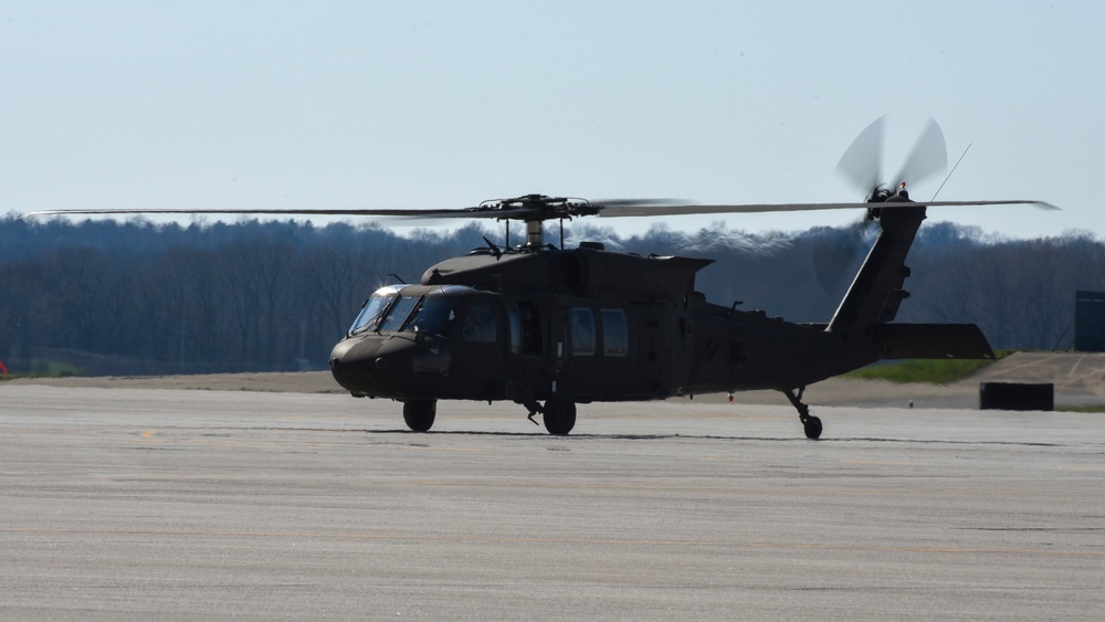 AH-64D Apache Longbows and a UH-60 Black Hawks arrive at Wright-Patterson
