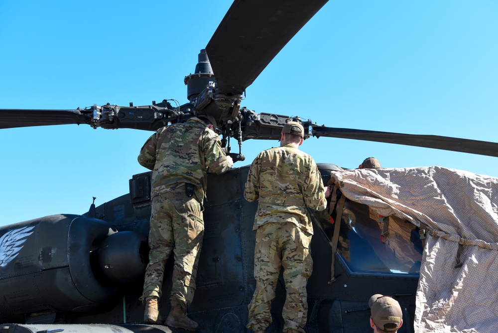 AH-64D Apache Longbows and a UH-60 Black Hawks arrive at Wright-Patterson
