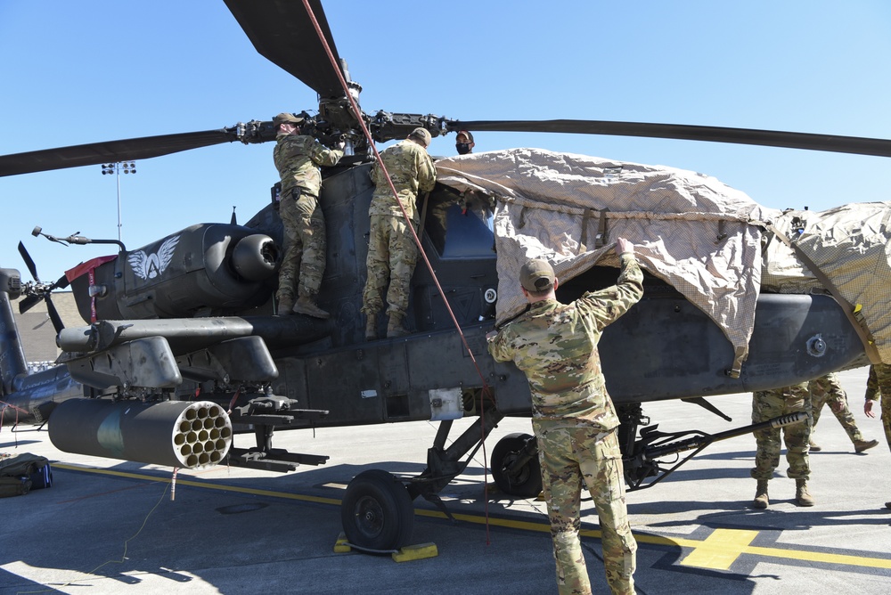 AH-64D Apache Longbows and a UH-60 Black Hawks arrive at Wright-Patterson