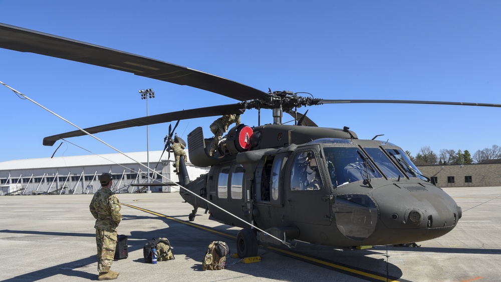AH-64D Apache Longbows and a UH-60 Black Hawks arrive at Wright-Patterson
