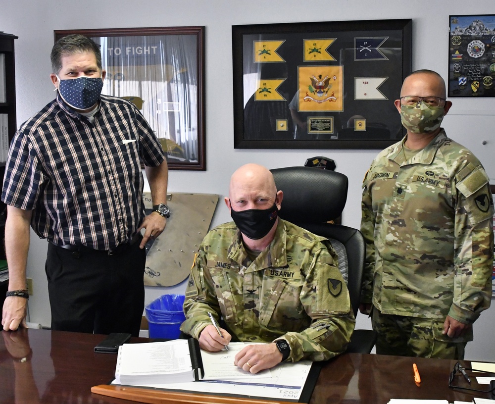 Commander U. S. Army Garrison Fort Bliss signs Fort Bliss Installation Mobilization Support Plan