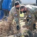 KFOR Soldiers help clean up cemetery