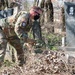 KFOR Soldiers help clean up cemetery