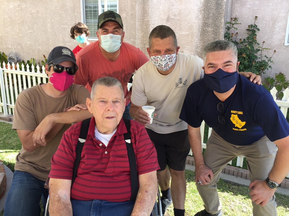 Los Angeles Chiefs build wheelchair ramp for retired Senior Chief Cosgrove.