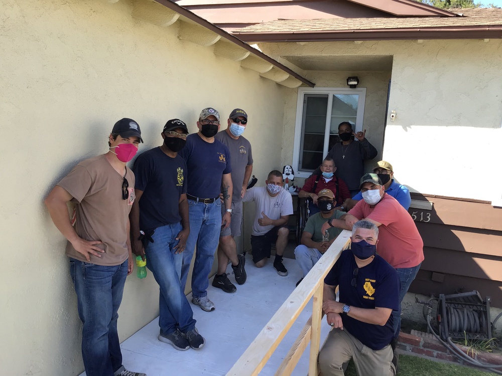 Los Angeles Chiefs build wheelchair ramp for retired Senior Chief Cosgrove.