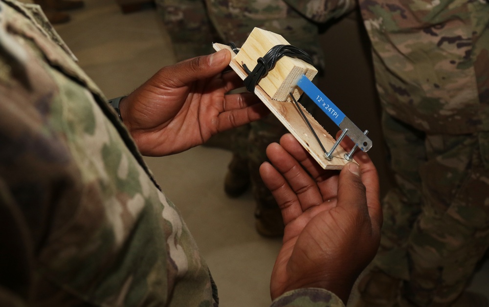 U.S. Army Soldiers learn about IEDs at IS 21