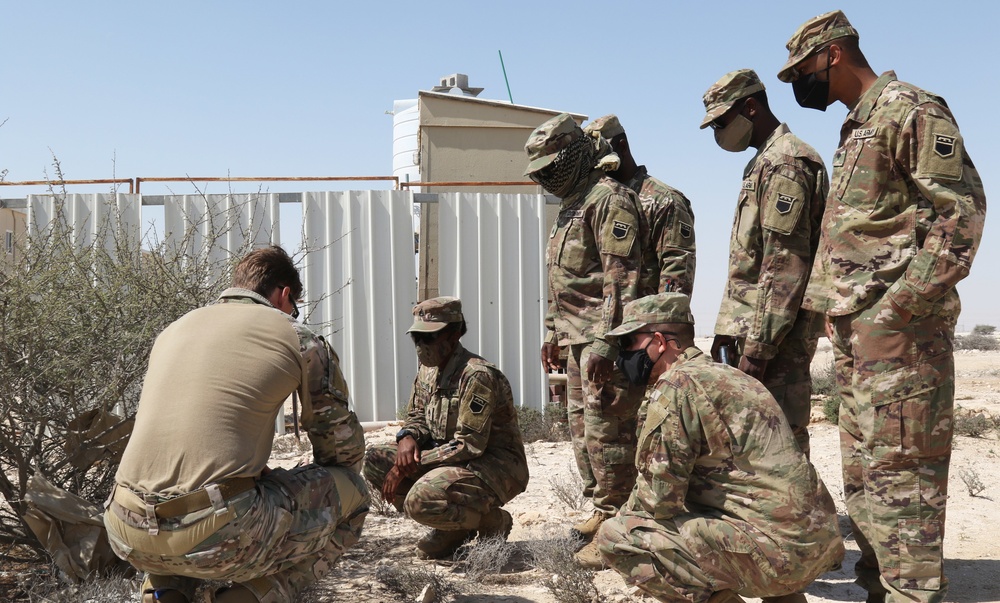 U.S. Army Soldiers learn about IEDs at IS 21