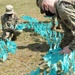 Airmen Promote Sexual Assault Awareness and Prevention Month by planting SAPR Flags