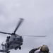 Australian sailors launch Sea Hawk helicopters aboard USS John Finn