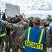 Sailors attempt to break through a line of security as part of an anti-terrorism training team drill