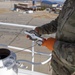POL Airmen Inspect Newly Refurbished Fuel Tank