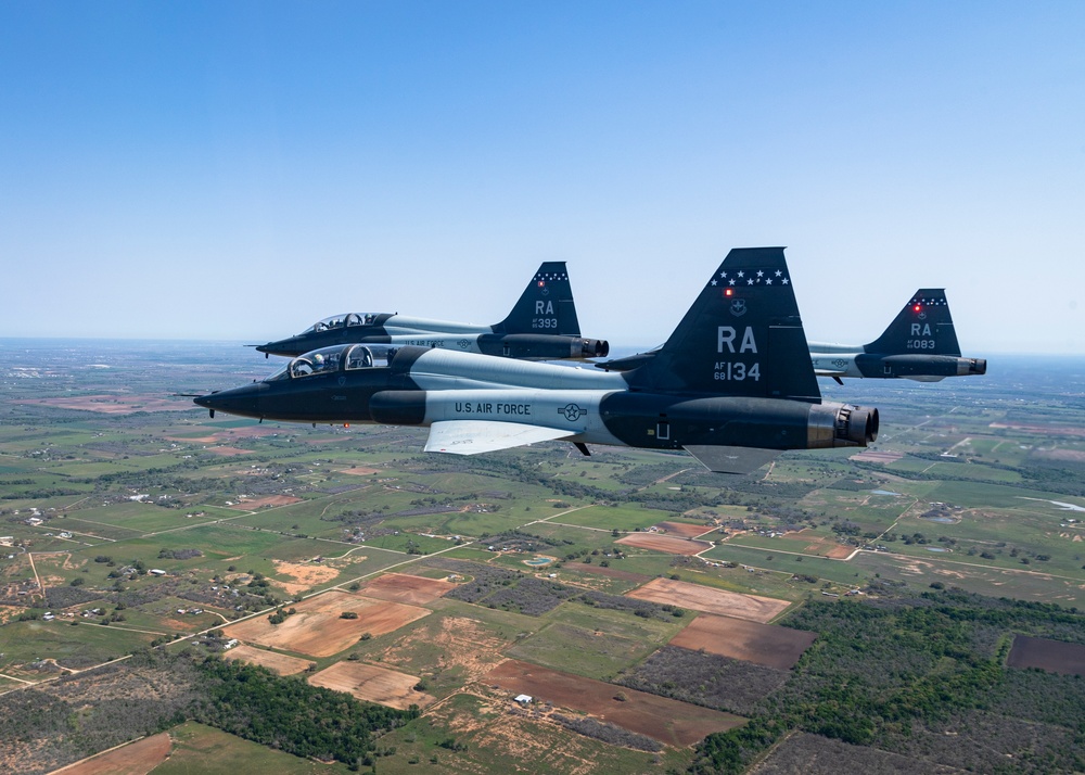 560th Flying Training Squadron Performs Missing Man Formation honoring Vientam POWs